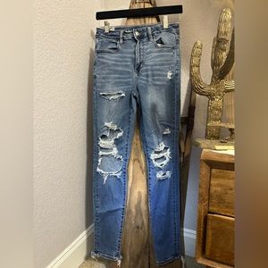 Medium wash American Eagle distressed skinny jeans